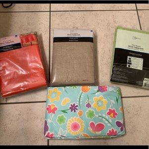 4 -70 inch round vinyl tablecloths - soft backing.